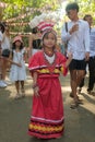 Malaybalay City, Philippines - young girl in ethnic Talaandig tribal costume flashes peace sign at the annual Kaamulan Festival.