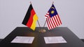 Malaysia and Germany flag, politics relationship, national flags. Partnership deal 3D illustration