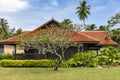 Wooden bungalow among a beautiful garden in Pelangi Beach Resort Royalty Free Stock Photo