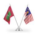 Malaysia and Maldives table flags isolated on white 3D rendering