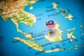 Malaysia marked with a flag on the map Royalty Free Stock Photo