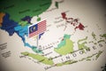 Malaysia marked with a flag on the map Royalty Free Stock Photo