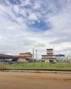 Refinary plant and storage tank farm with blue sky background.