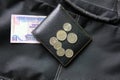 Malaysia ringgit and coins on black wallet. Royalty Free Stock Photo