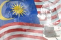 Malaysia science development conceptual background - microscope on flag. Research in physics or medicine, 3D illustration of