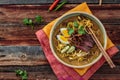 Malaysia Spicy Noodle Mee Rebus With Beef Egg and fried onion, copy space