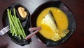 Malaysia Traditional Dish, Patin tempoyak stews served with long beans kacang panjang served with tempoyak Royalty Free Stock Photo