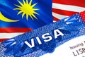 Malaysia Visa in passport. USA immigration Visa for Malaysia citizens focusing on word VISA. Travel Malaysia visa in national Royalty Free Stock Photo