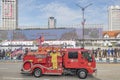 Malaysian fire and rescue truck with woman firefighter onboard.