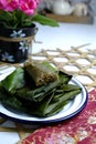 Malaysian homemade traditional food called kuih lepat pisang wrapped in banana leaves, for iftar