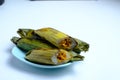 Malaysian homemade traditional food called kuih lepat pisang wrapped in banana leaves, for iftar