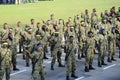 Malaysian soldiers in uniform and fully armed.