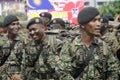 Malaysian soldiers in uniform and fully armed.