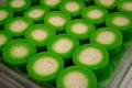 Malaysian traditional food Kuih Nona Manis or Nona Manis Cake, soft steamed pudding with pandan leaves, made from glutinous rice Royalty Free Stock Photo