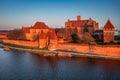 Malbork castle over the Nogat river at sunset, Poland