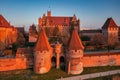 Malbork castle over the Nogat river at sunset, Poland