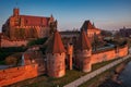 Malbork castle over the Nogat river at sunset, Poland