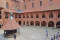 MALBORK, POLAND. Courtyard with a well on the territory of the High Knight`s Castle of the Teutonic Order Royalty Free Stock Photo