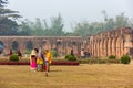 Malda, West Bengal, India - January 2018: A group of female tourists in the gardens of the ruins of the ancient Adina Masjid