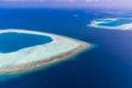 Maldives aerial panorama blue water reef and coral islands Royalty Free Stock Photo