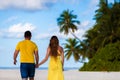 Maldives, a couple walking on the beach Royalty Free Stock Photo