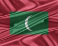 Maldives flag with a glossy silk texture. Royalty Free Stock Photo