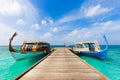 Maldives island a traditional boats for tourist and tourism for snorkeling and diving view from wooden jetty