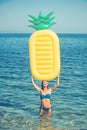 Maldives or Miami beach water. Girl sunbathing on beach with air mattress. Sexy woman on Caribbean sea in Bahamas Royalty Free Stock Photo