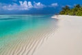 Maldives paradise beach. Perfect tropical island. Beautiful palm trees and tropical beach. Moody blue sky and blue lagoon. Luxury Royalty Free Stock Photo