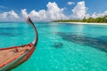 Maldives perfect beach landscape with Dhoni and tropical island background Royalty Free Stock Photo