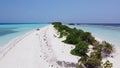 Maldives resort island drone aerial view, Indian ocean atoll nature beach and palm forest, leisure tourist luxury vacation Royalty Free Stock Photo