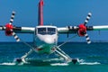 Seaplane at tropical beach resort. Luxury summer travel destination with seaplane in Maldives islands. Exotic vacation or holiday