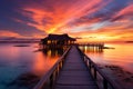 Maldives sunset at luxury water villas, a dreamy beach paradise Royalty Free Stock Photo