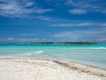 Maldives tropical islands panoramic scene, idyllic beach palm tree vegetation and clear water Indian ocean sea, tourist resort Royalty Free Stock Photo