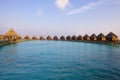 Maldives. Villa on piles on water at the time su