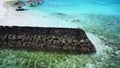 Maldives white sand beach bamboo hut with crytal sea wave