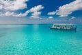 Maldivian dhoni boat in blue ocean background. Maldives traditional wooden boat called Dhoni. Tropical sea and wooden boat Royalty Free Stock Photo