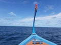 Maldivian dhoni at dark blue Indian Ocean