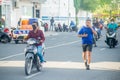 Maldivian sportsman jogging on the road during covid-19