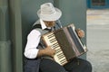 Male accordion player in town center of Sevilla, Andalucia, Southern Spain