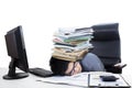 Male accountant with stack of paperwork