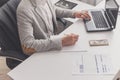 A male accountant works at a pc in an office at home Royalty Free Stock Photo