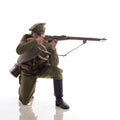 Male actor in the form of an ordinary soldier of the Russian army during the First World War posing against a white background in Royalty Free Stock Photo