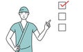 Male admitted patient in hospital gown pointing to a checklist