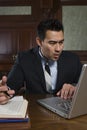 Male Advocate Using Laptop Royalty Free Stock Photo