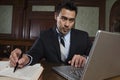 Male Advocate Using Laptop Royalty Free Stock Photo