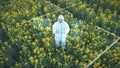 Male agricultural engineer in suit working with futuristic device Royalty Free Stock Photo