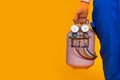 A male air conditioner repairman is holding a freon cylinder and a pressure measurement sensor in his hand for air conditioning Royalty Free Stock Photo