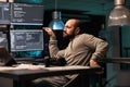 Male app developer feeling happy and dancing
