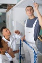 male apprentice painter at work Royalty Free Stock Photo